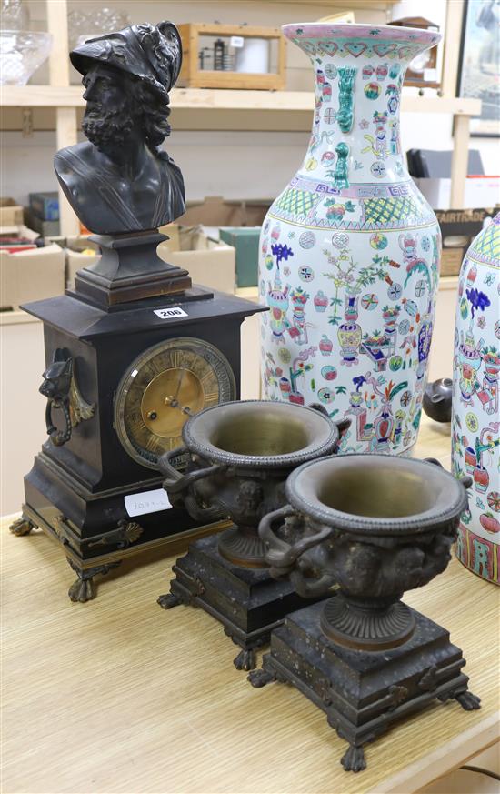 A bronze and slate three piece clock garniture clock height 59cm